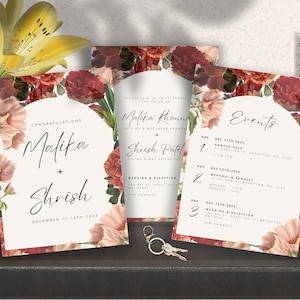 May include: Three white cards with floral borders and black text announcing a wedding. The top card says "Congratulations Malika + Shrish December 11-13th 2023". The middle card says "Please join us to celebrate the union of Malika Khanna to Shrish Patel". The bottom card says "Events" and lists the dates and times of the wedding events.