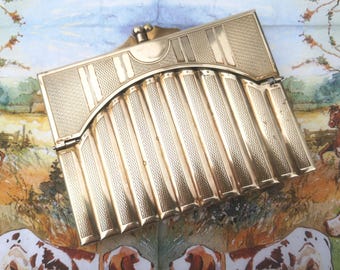Antique Gilt Metal Case holding Ten Butt Markers / Peg Finders c 1930