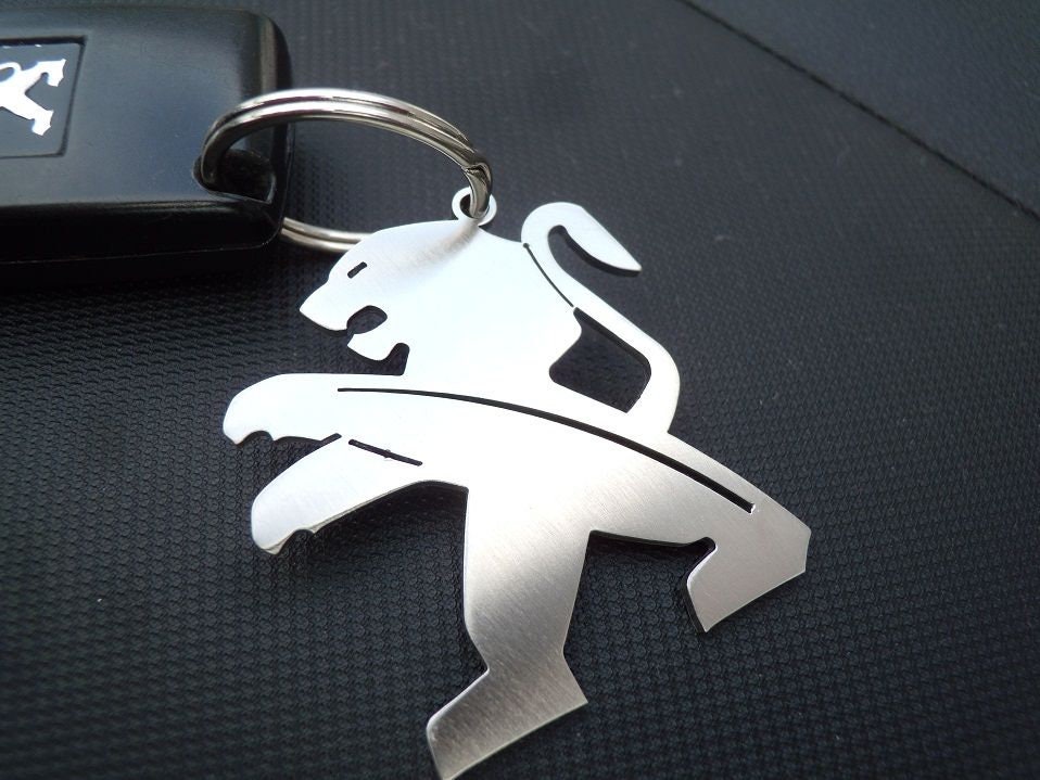 Porte-clé Peugeot 206 S16 grise en pvc souple - fr