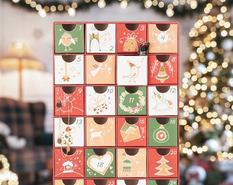 Calendrier de l'Avent à remplir soi-même avec 24 tiroirs. Calendrier de Noël DIY avec chiffres et motifs pour enfants et adultes.