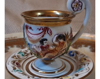 Capodimonte Italy Porcelain Demitasse Cup Saucer Bas Relief Mythological Gold