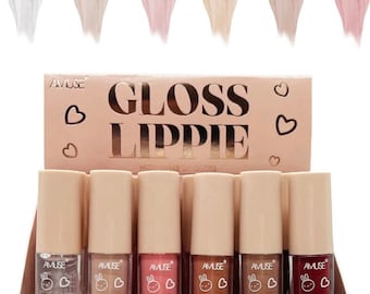 May include: A set of six lip glosses in a clear plastic display case. The glosses are labeled "Gloss Lippie" and come in shades of clear, light pink, pink, peach, brown, and red.