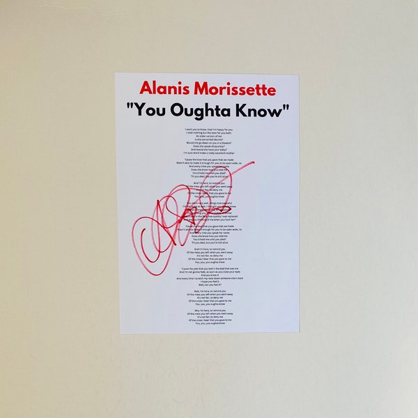 Feuille de paroles A4 signée Alanis Morissette