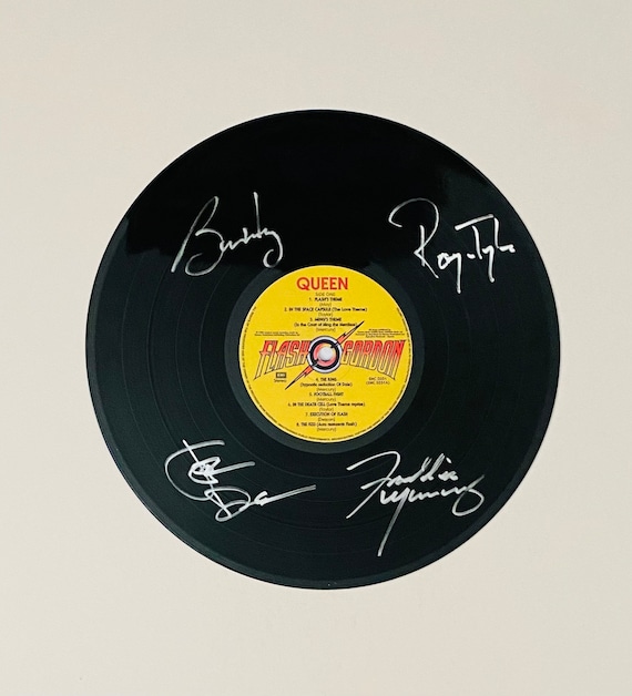 Exhibición de discos de vinilo firmados Queen Flash Gordon 