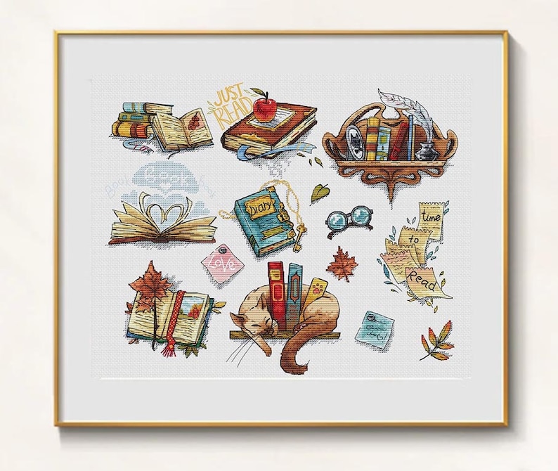 May include: A framed cross-stitch depicting book-related illustrations. It features stacks of books, open books, a cat resting on a shelf with books, and the text "Just Read" and "Time to Read". The color scheme includes browns, oranges, and blues.