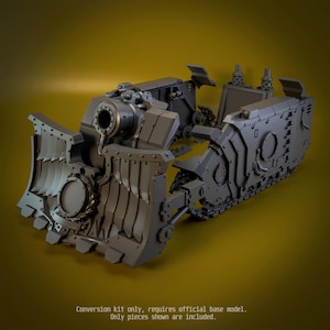 May include: A grey plastic conversion kit for a miniature tank model, featuring a large front dozer blade with rivet details, a central cannon mount, and side track armour panels. Text at the bottom reads: Conversion kit only, requires official base model. Only pieces shown are included.