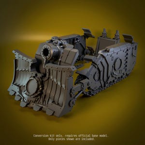 May include: A grey plastic conversion kit for a miniature tank model, featuring a large front dozer blade with rivet details, a central cannon mount, and side armor plating. Text at the bottom reads: Conversion kit only, requires official base model. Only pieces shown are included.