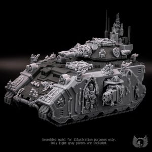 May include: A grey plastic miniature tank model featuring intricate gothic architectural details, including arched windows, sculpted figures, and chain embellishments. The tank has a turret with dual cannons and a top-mounted sensor array. Text reads: Assembled model for illustration purposes only. Only light grey pieces are included.