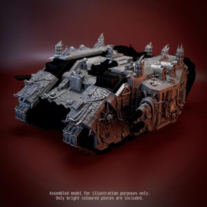 May include: A grey plastic model of a futuristic armoured tank featuring intricate gothic-style engravings, side-mounted cannons, and spiked decorative elements. The text at the bottom reads: Assembled model for illustration purposes only. Only bright coloured pieces are included.