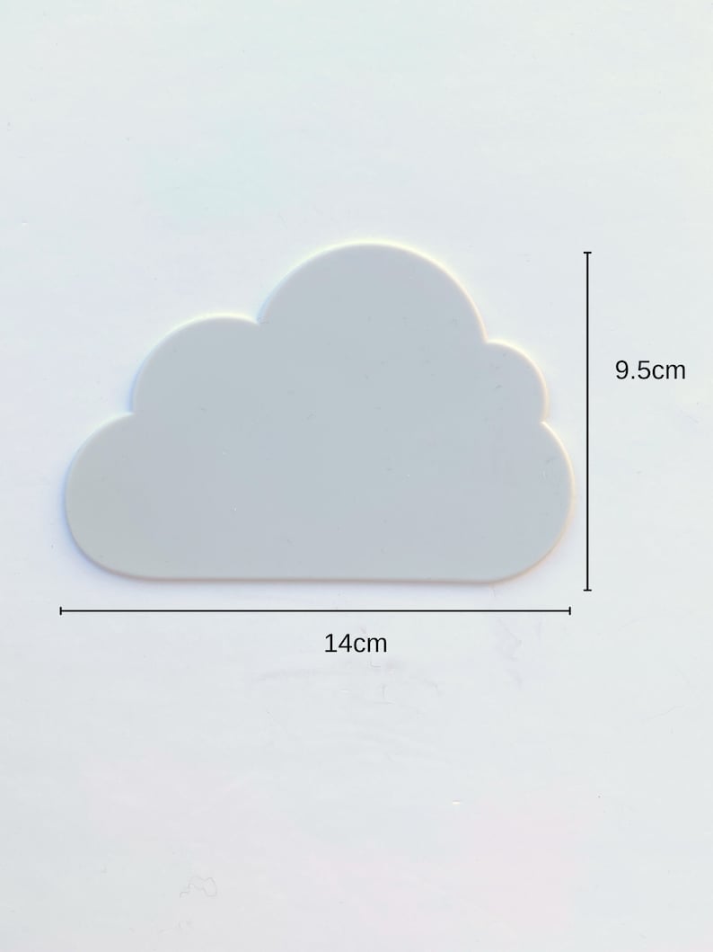 May include: A white cloud-shaped silicone mold, measuring 9.5 inches by 14 inches.
