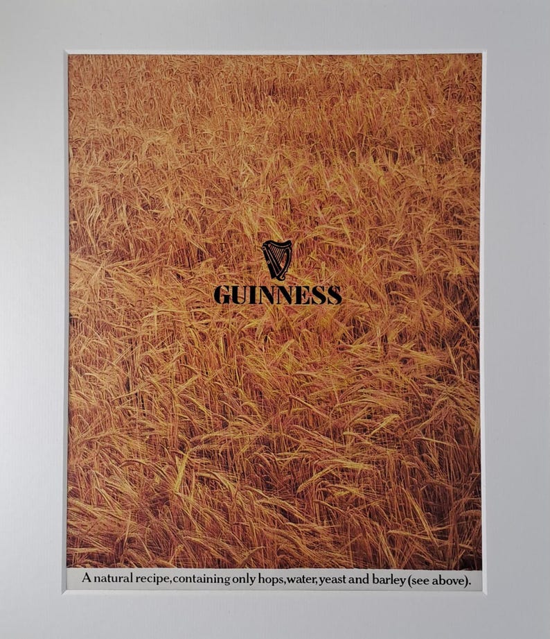 May include: A close-up of a field of golden barley with the Guinness logo and the text "A natural recipe, containing only hops, water, yeast and barley (see above)."