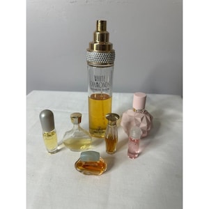 Lote de perfumes Estee' Lauder Lancome Nina Ricci Ariana G. White Diamonds Chantilly