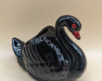 Black swan ornament 3 inches tall by Dartmouth pottery, empty body to hold something small