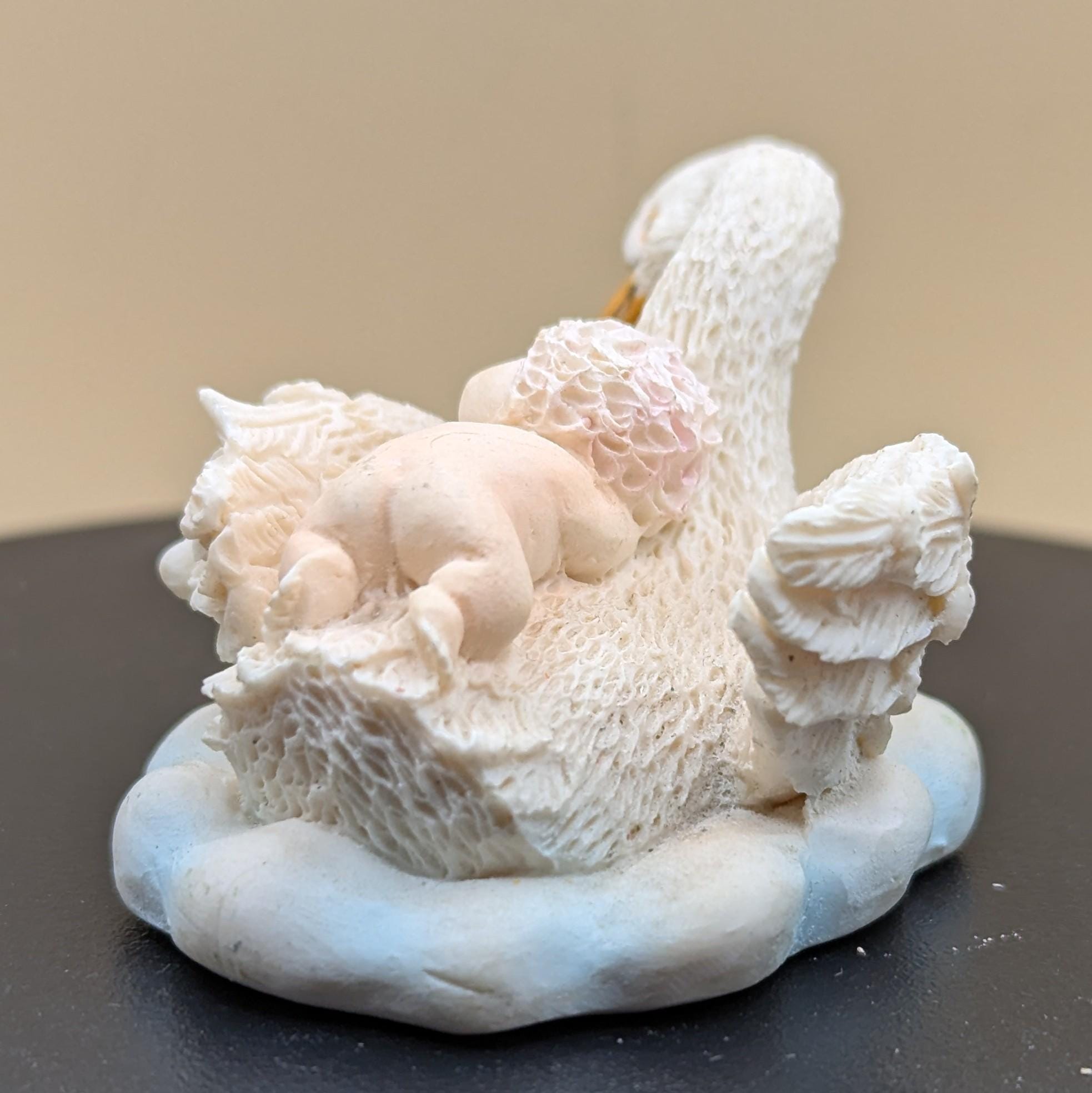 【新品未使用】heve Swan Grace BL white Baby Resting in the Wings of a Graceful Swan. Resin. - Etsy
