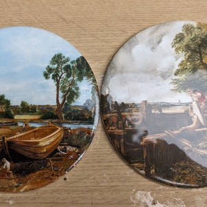 Two Round tiles by R & H Johnson&#39;s boat scenes by Constable