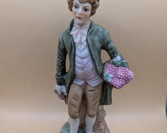 Figurine vintage en porcelaine - Homme colonial victorien récoltant des raisins