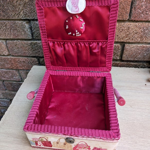 1950s pink sewing box with movable handle, fabric sewing basket, sewing accessories, sweet box. With pins.