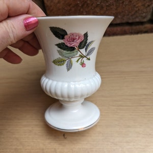 Wedgwood bone china &#39;Hathaway Rose&#39; small urn shaped footed vase.