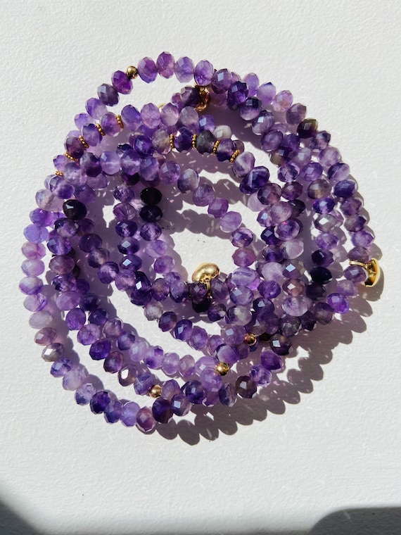 Amethyst stretchy bracelets with gold spacers, handmade, beaded bracelets, birthday gemstones. Gifts for her.