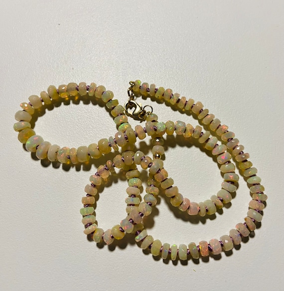 Rare Faceted Ethiopian Opal Hand knotted beaded necklace with 14kt gold lobster clasp