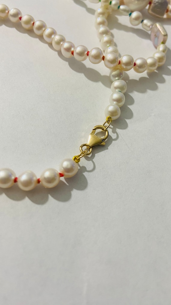 Hand knotted Pearl necklace 14k lobster clasp