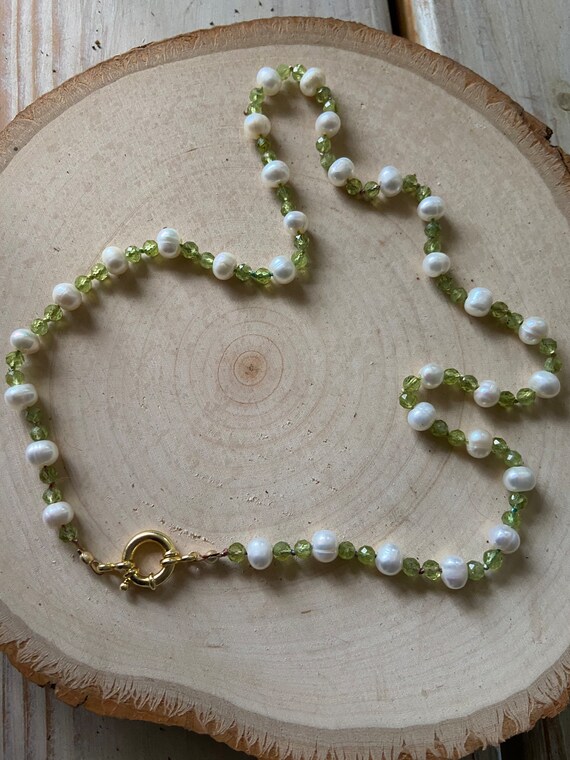 Hand knotted colorful silk string, Beautiful Peridot and freshwater Pearls, Available in Solid gold or Sterling silver. Gifts for her.