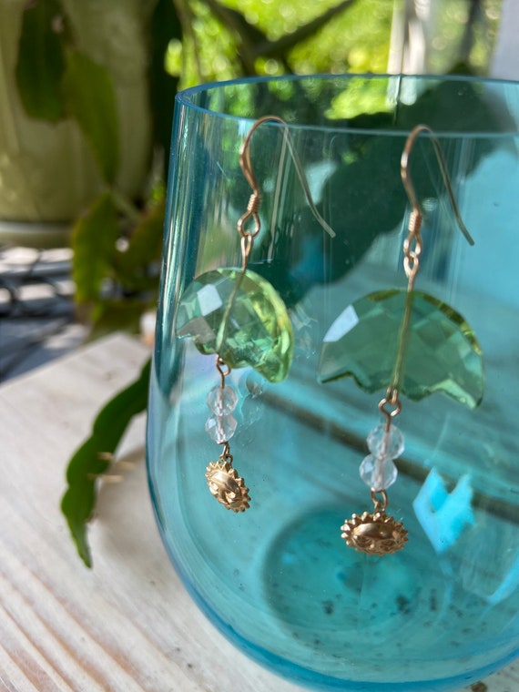 Green umbrella shape amethyst drop earrings. With moonstone bead and gold filled sun charm. Dainty gemstone drop earrings