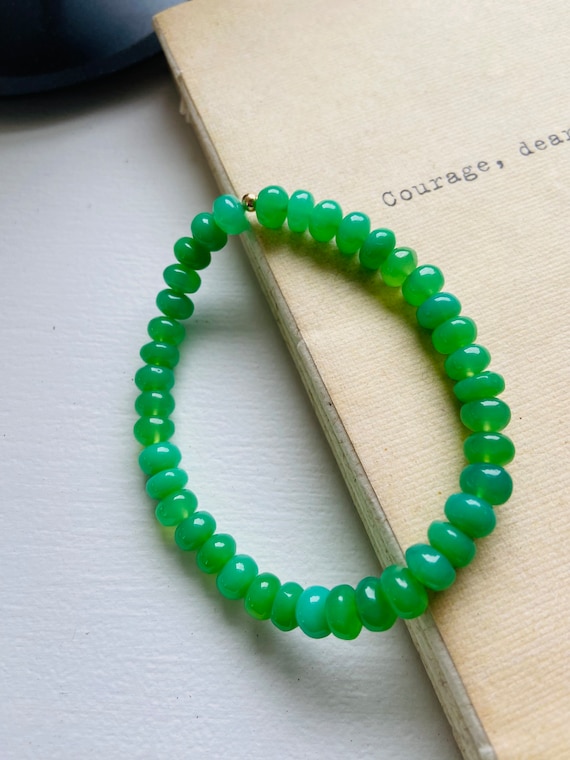 Hand made stretchy beaded chrysoprase bracelets with 14k closure.