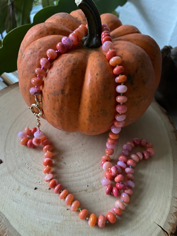 Hand knotted Candy corn opal 5mm, size sailor clasp 10mm. Necklace size 20 inches.