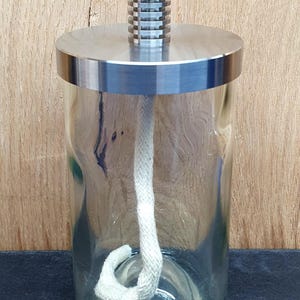 Oil lamp made from a glass bottle