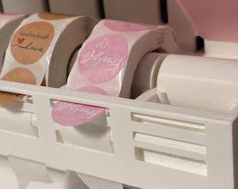 Skadis accessories, pegboard sticker dispenser.