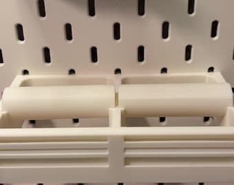Skadis  pegboard compatible large 2 roll sticker dispenser.