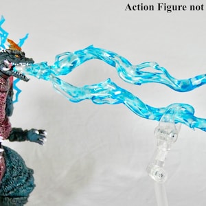 May include: Blue translucent plastic effect pieces for a Godzilla action figure.  Action Figure not included.