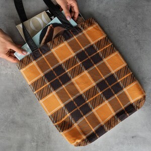 Orange and black plaid tote bag perfect for your fall aesthetic. Available in three sizes and multiple color options for the handles.