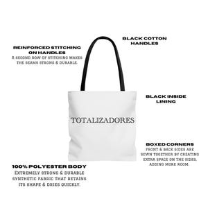 May include: White tote bag with black handles and the word "TOTALIZADORES" printed in black. The bag is made of 100% polyester and has reinforced stitching on the handles, a black inside lining, and boxed corners.