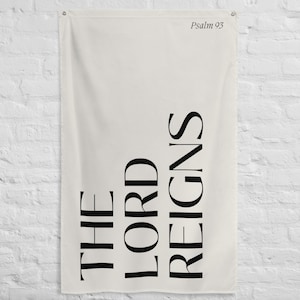 May include: White tapestry with black text that reads "The Lord Reigns" and "Psalm 95".