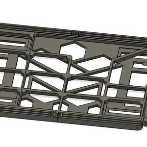 Könnte beinhalten: Ein dunkelgrauer, klappbarer Kunststoff-Organizer mit mehreren Fächern und geometrischen Aussparungen. Der Organizer ist geöffnet und zeigt seine innere Struktur. Er ist für die Aufbewahrung und Organisation konzipiert.