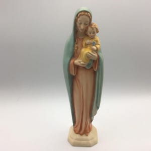 Vintage Hummel Porcelain figurine of the Virgin Mary holding the Christ Child, commonly known as a Flower Madonna or Madonna and Child