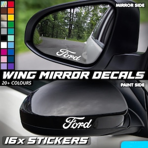 May include: Black car wing mirror decals featuring the Ford logo in white. The image displays the decals on the mirror and paint sides. Text includes "WING MIRROR DECALS" and "16x STICKERS".