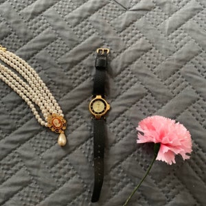 Vintage 80-90s Gitano leather band ladies watch.