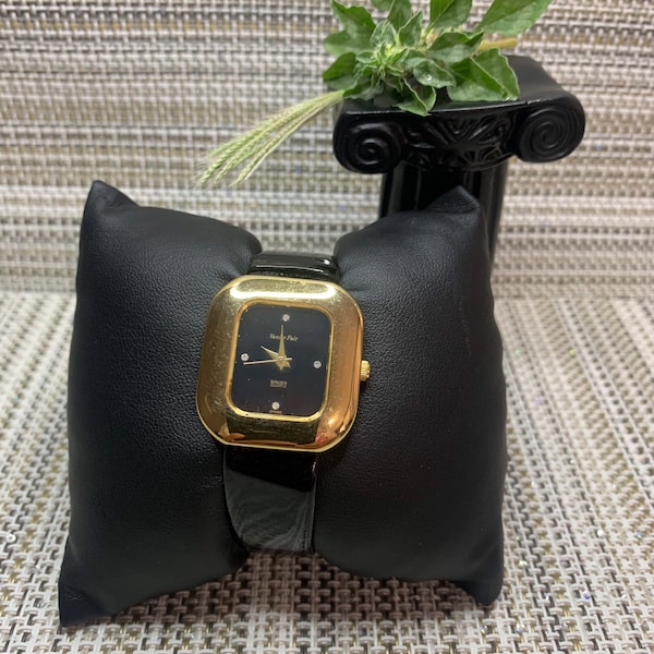 Vintage Vanity Fair gold tone square shaped ladies watch.