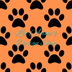May include: A seamless pattern featuring black paw prints on a peach background. The text "Lee Anne's Design Shop" is centered on the pattern.