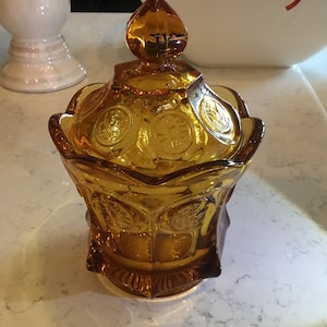 Amber Fostoria coin jar with lid