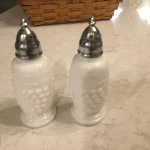 Imperial glass salt and pepper shakers grape pattern