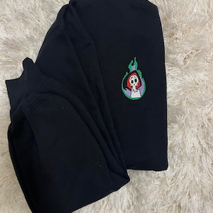 Embroidered The Grim Adventures Sweater
