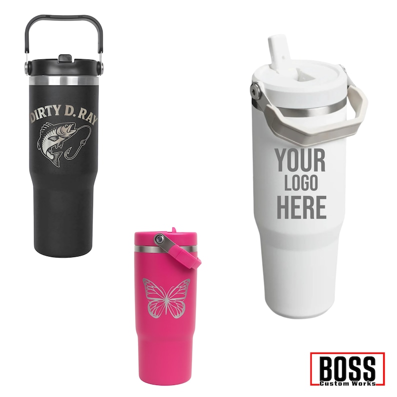 May include: Three insulated tumblers in black, white, and pink. The black tumbler has "DIRTY D. RAY" and a fish graphic. The white tumbler has "YOUR LOGO HERE". The pink tumbler features a butterfly design. All have handles.