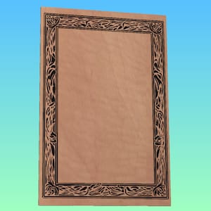 May include: A blank, light brown paper with a black decorative border. The border is made up of a repeating pattern of leaves and flowers.