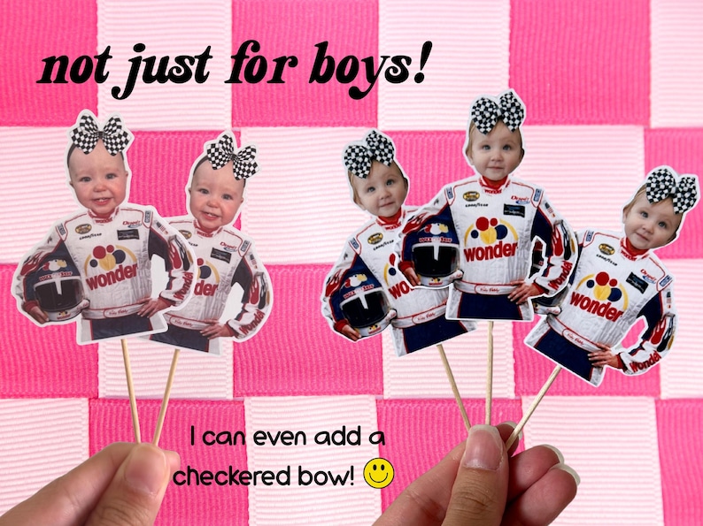 May include: Cupcake toppers with a baby's face in a racing suit and a checkered bow. The toppers are on wooden sticks, with the text "not just for boys!" and "I can even add a checkered bow!" on a pink and white checkered background.