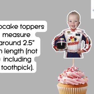 May include: A cupcake topper showing a child in a racing suit holding a helmet, placed on a cupcake with pink frosting and sprinkles. The topper is around 6.35 cm in length. Text on the image says 'cupcake toppers'.