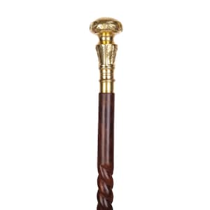May include: A walking stick with a twisted wooden shaft and a gold-coloured metal top with intricate detailing.
